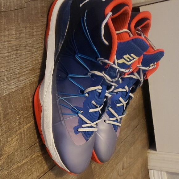 Nike Air Jordan CP3 V11 AE Blue and Red Athletic Sneakers